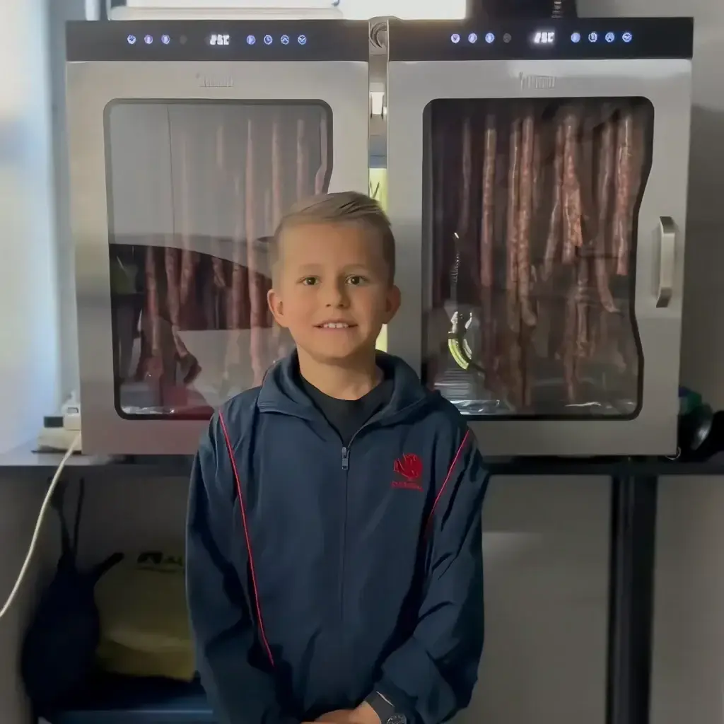 Droewors hanging in two Kalahari Khabu Biltong Boss cabinets